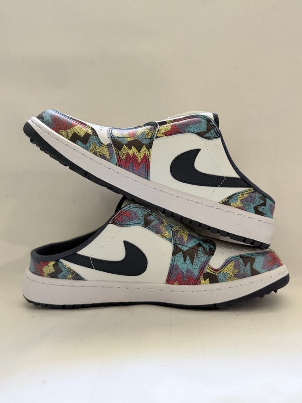 Nike Kids White Slip-On Sneakers with Black Swoosh and Multicolor Zigzag
